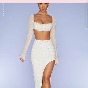 Selling this Oh Polly set. Never worn, tags still on. Top & shirt included.